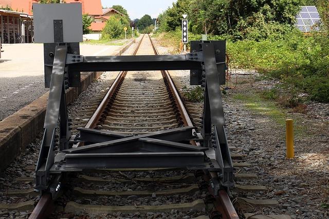 Railroad tracks are blocked by a buffer stop.