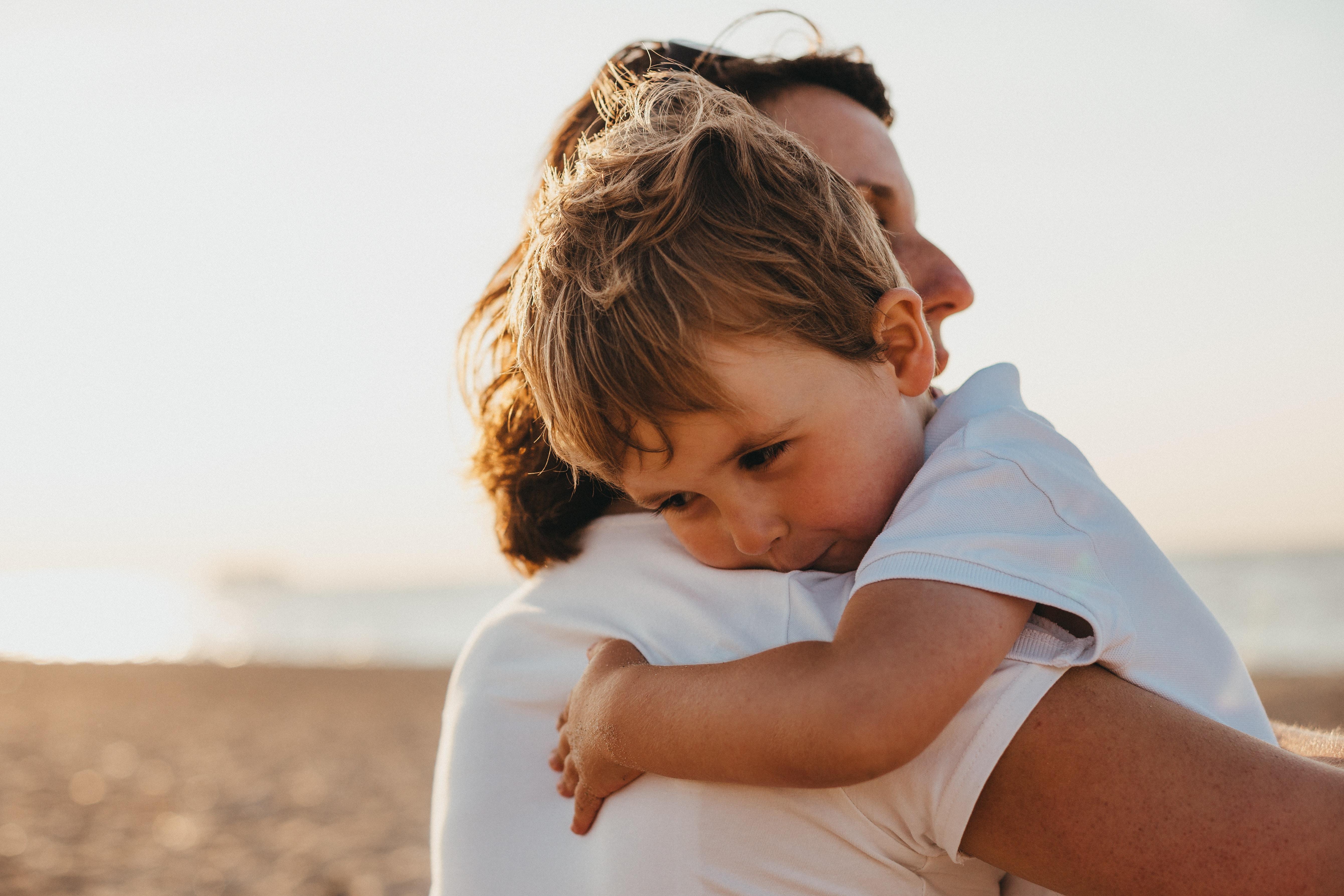 Mother holding young child